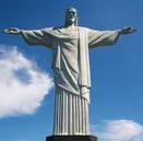 Bild på staty av Jesus med utsträckta armar.
